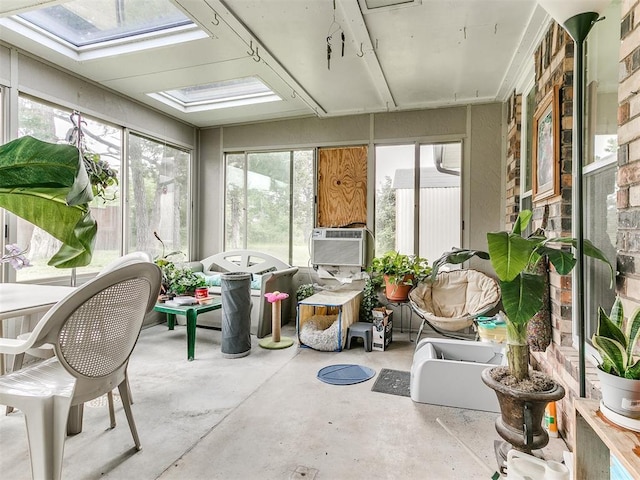 sunroom / solarium with a skylight and cooling unit