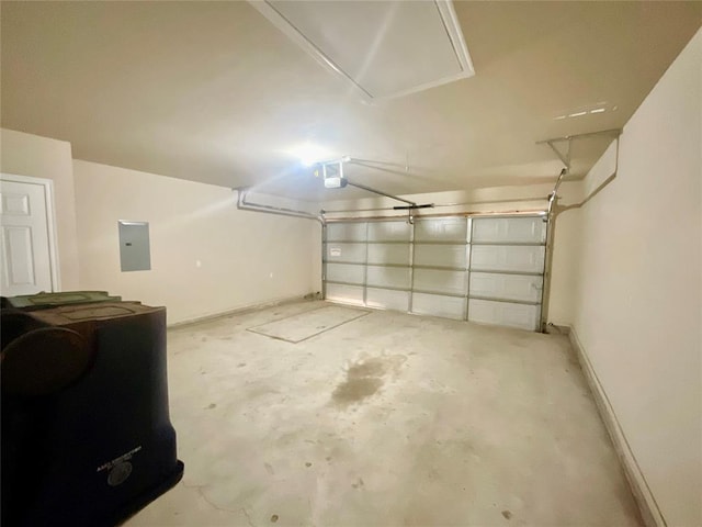 garage with electric panel and a garage door opener