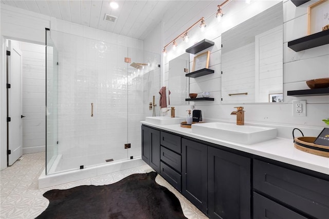 bathroom featuring vanity and walk in shower