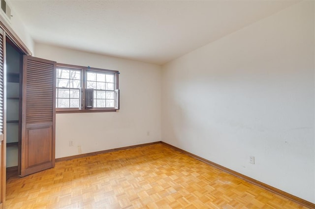 empty room with light parquet floors