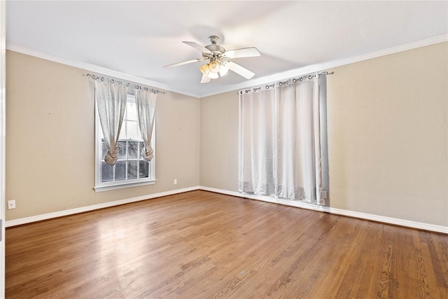 unfurnished room featuring wood-type flooring, ceiling fan, and crown molding