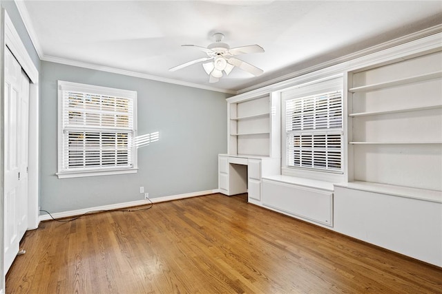 unfurnished bedroom with a closet, ceiling fan, light hardwood / wood-style flooring, and ornamental molding