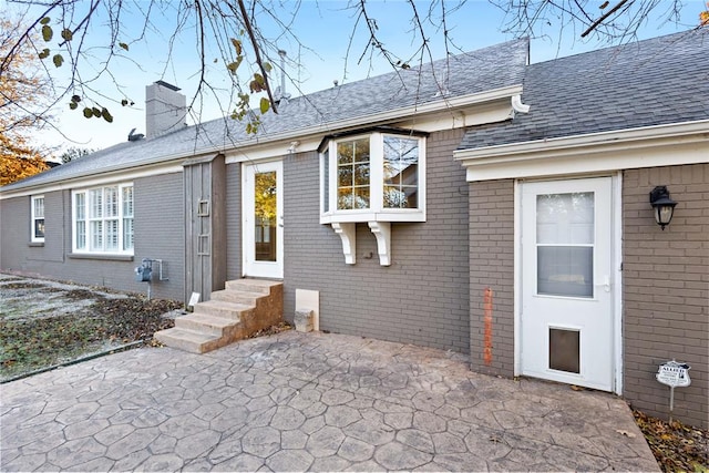 rear view of house with a patio area