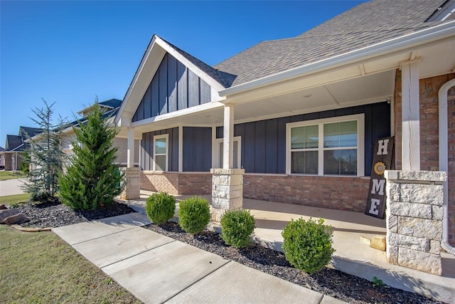 doorway to property featuring a porch