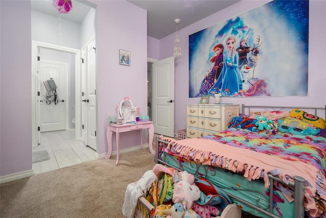 bedroom featuring light colored carpet