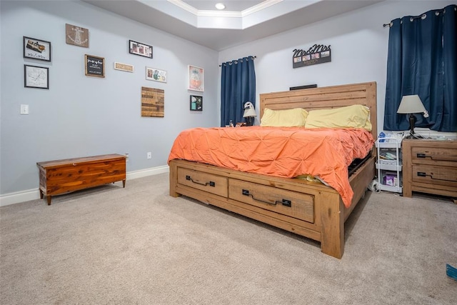 bedroom with a raised ceiling, ornamental molding, and light carpet