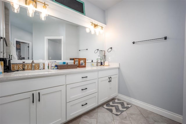 bathroom featuring tile patterned flooring and vanity