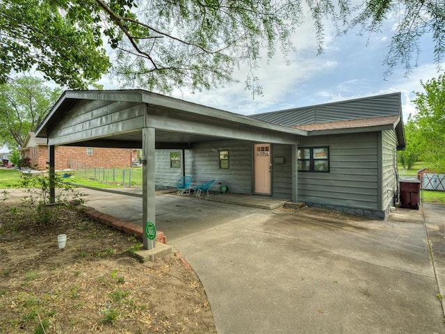 view of front of house with a carport