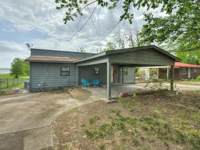 exterior space featuring a carport