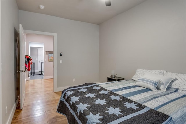 bedroom featuring ceiling fan and light wood-type flooring