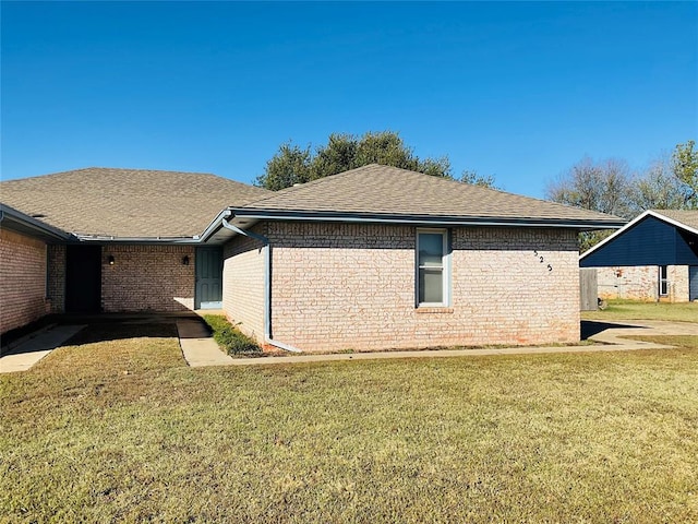 view of home's exterior with a yard