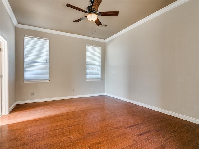 unfurnished room featuring hardwood / wood-style flooring, ceiling fan, and ornamental molding