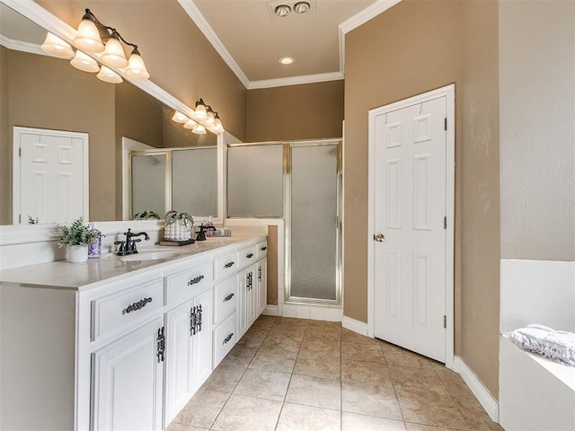 bathroom with crown molding, tile patterned flooring, vanity, and a shower with shower door