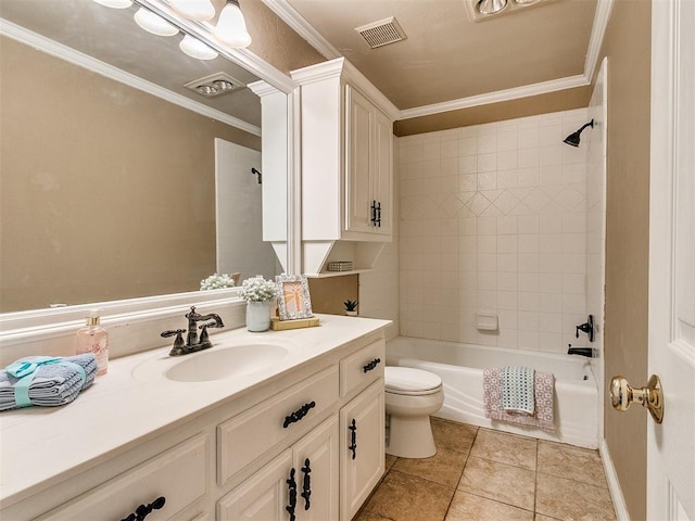 full bathroom with tile patterned floors, ornamental molding, vanity, tiled shower / bath combo, and toilet