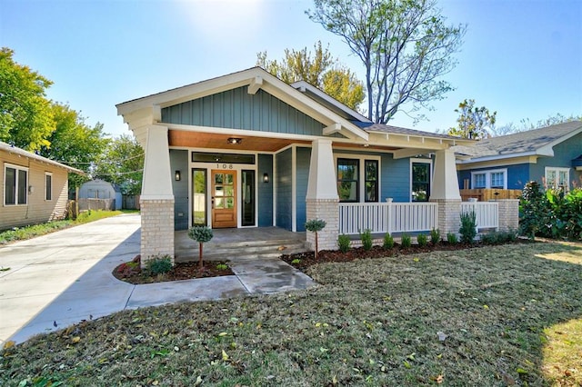 craftsman-style home featuring covered porch