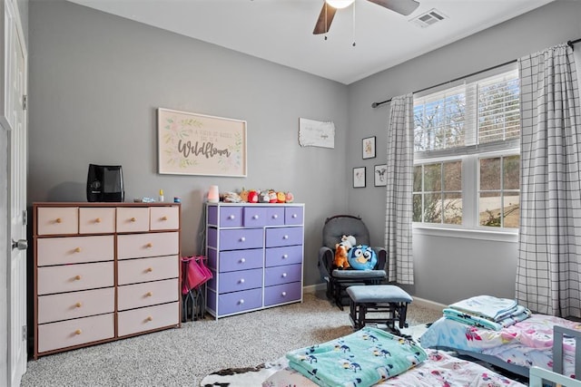 bedroom featuring ceiling fan and light colored carpet