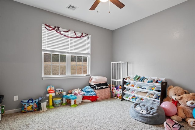 rec room featuring ceiling fan and carpet floors