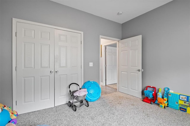 rec room with carpet flooring