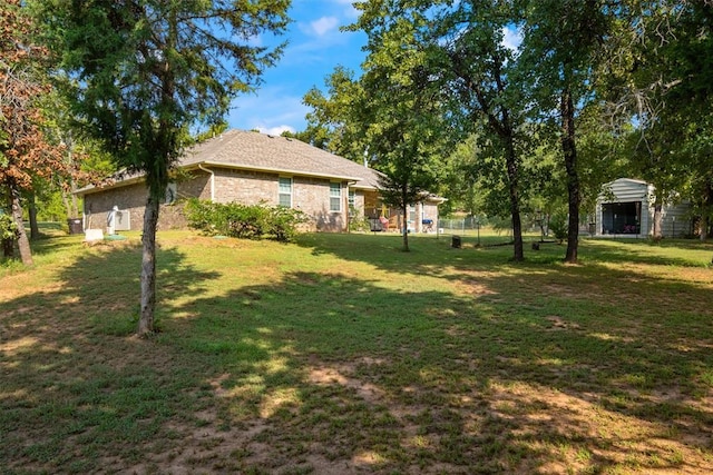 view of yard with a detached carport