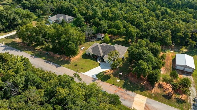 bird's eye view featuring a view of trees