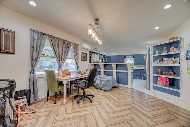 office featuring an AC wall unit and light parquet floors