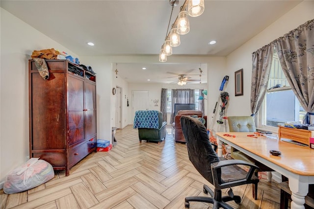 office area featuring ceiling fan and light parquet floors