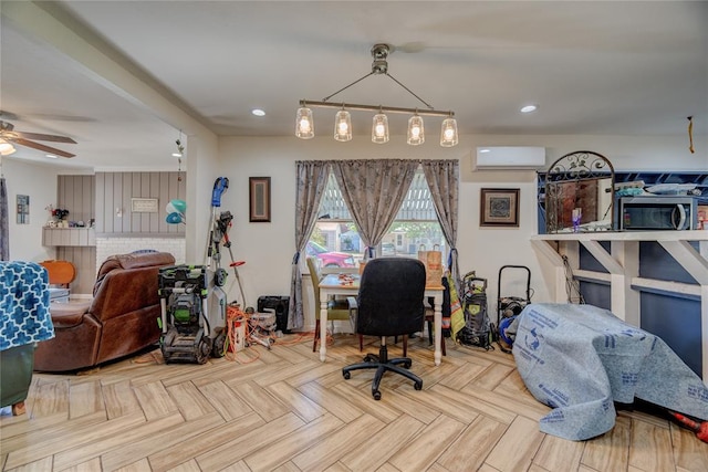 office featuring ceiling fan, an AC wall unit, and light parquet flooring