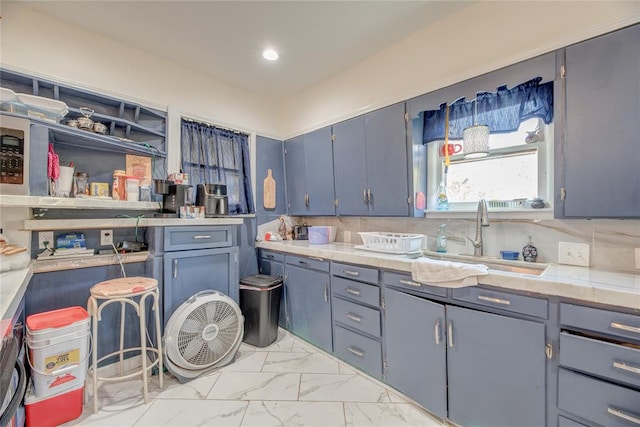 kitchen with decorative backsplash and sink