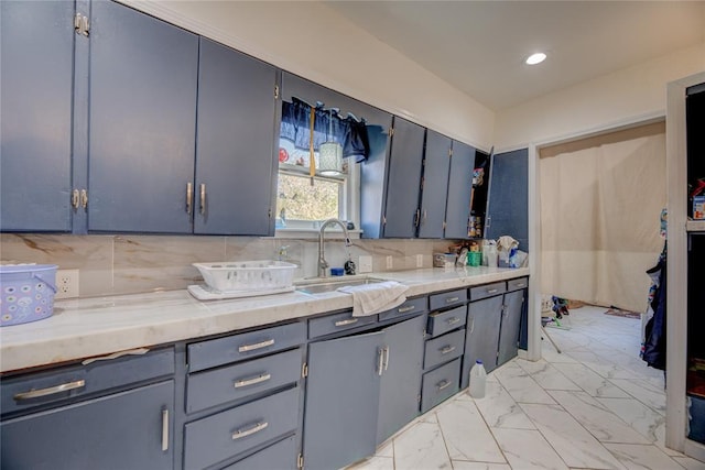 kitchen with decorative backsplash and sink