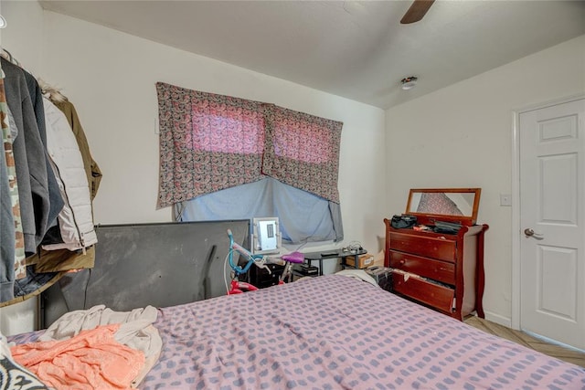 bedroom featuring ceiling fan