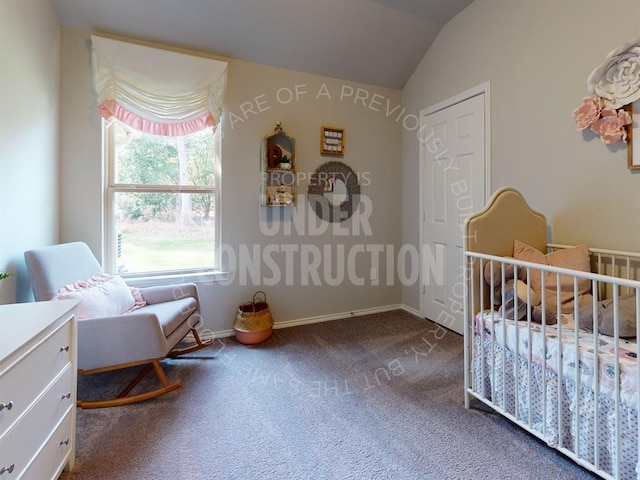 bedroom featuring carpet flooring, lofted ceiling, and a crib