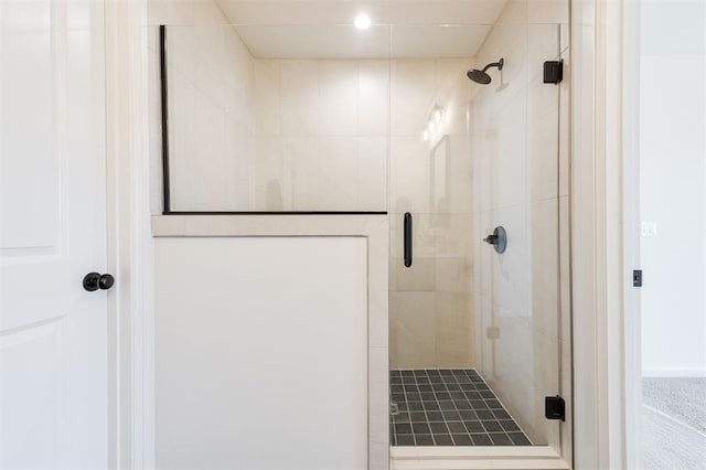 full bathroom featuring a shower stall