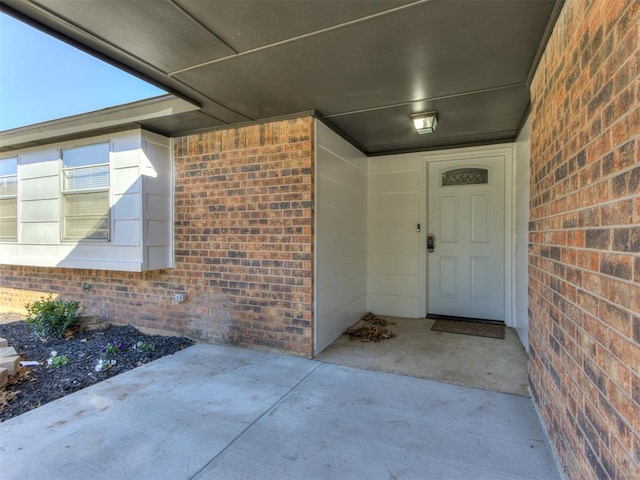 doorway to property featuring a patio