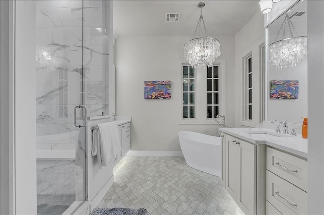 bathroom with vanity, plus walk in shower, and an inviting chandelier