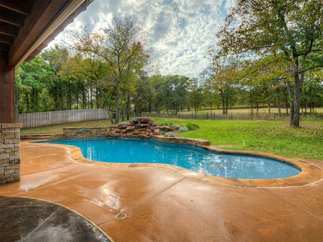 view of pool featuring a patio