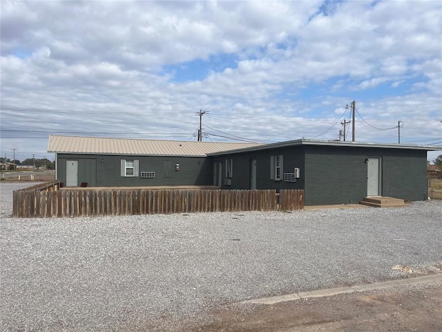 701 N Park Ln, Altus, OK 73521 - back of property with metal roof