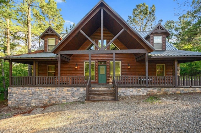 cabin featuring covered porch