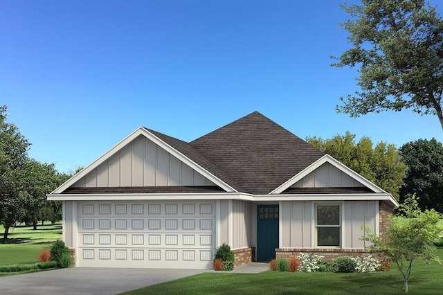 view of front facade with a front yard and a garage