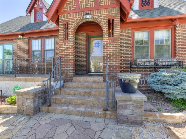 property entrance featuring covered porch