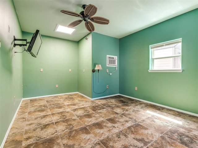 unfurnished room with an AC wall unit and ceiling fan