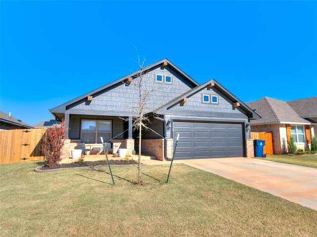 view of front facade featuring a front lawn and a garage