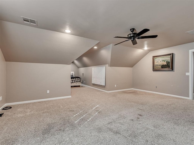 bonus room with carpet flooring, ceiling fan, and lofted ceiling