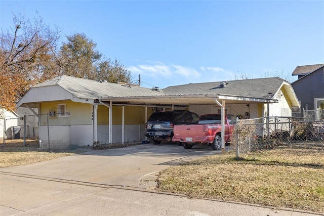 view of front of home with a carport