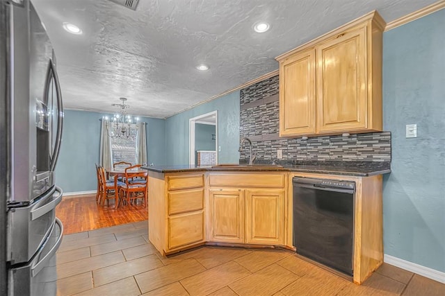 kitchen with dishwasher, sink, light hardwood / wood-style flooring, kitchen peninsula, and stainless steel fridge