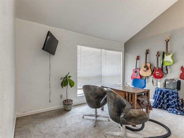 carpeted office space with a wealth of natural light and lofted ceiling