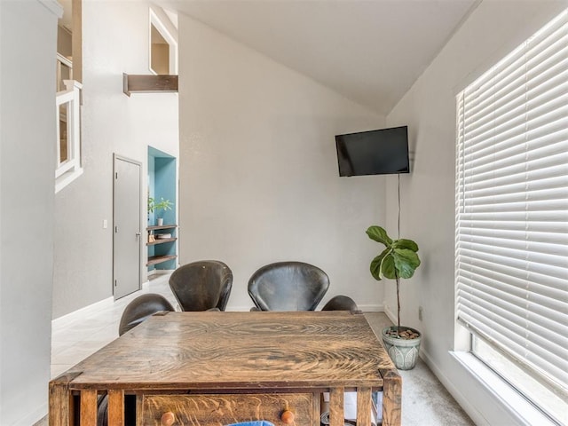 office space featuring vaulted ceiling