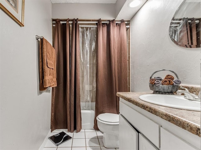 full bathroom featuring toilet, shower / bath combination with curtain, vanity, and tile patterned floors