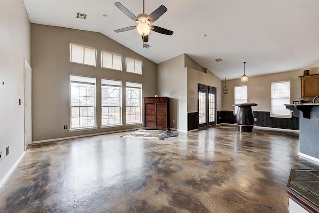 living room with high vaulted ceiling and ceiling fan