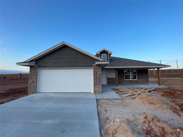 view of front of home with a garage