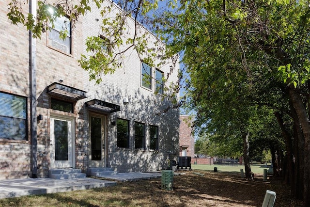 view of front of home with central air condition unit